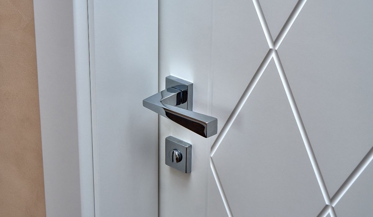 bathroom door handle and lock on a white door