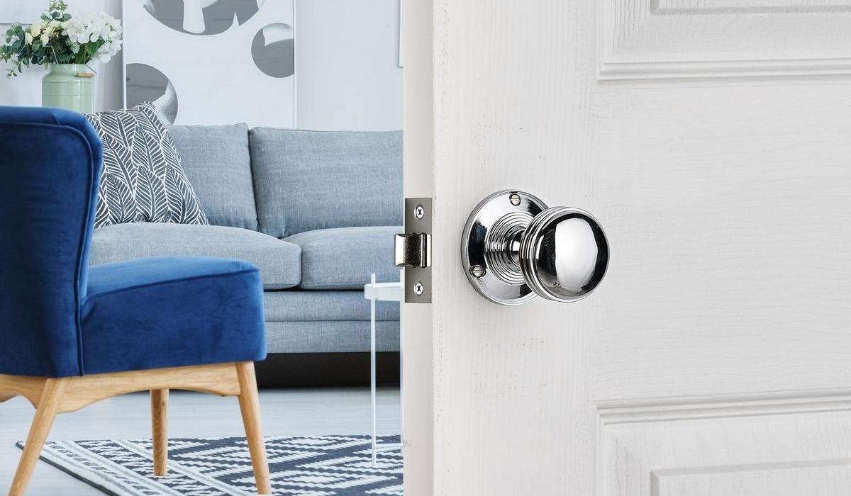 Mortice Ringed Door Knob In Chrome Finish on a door