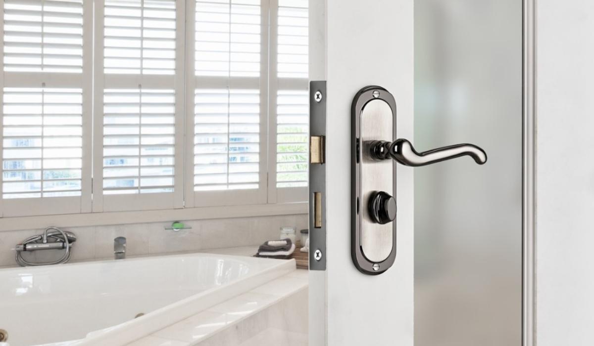 Turnberry lever door handle on a bathroom door
