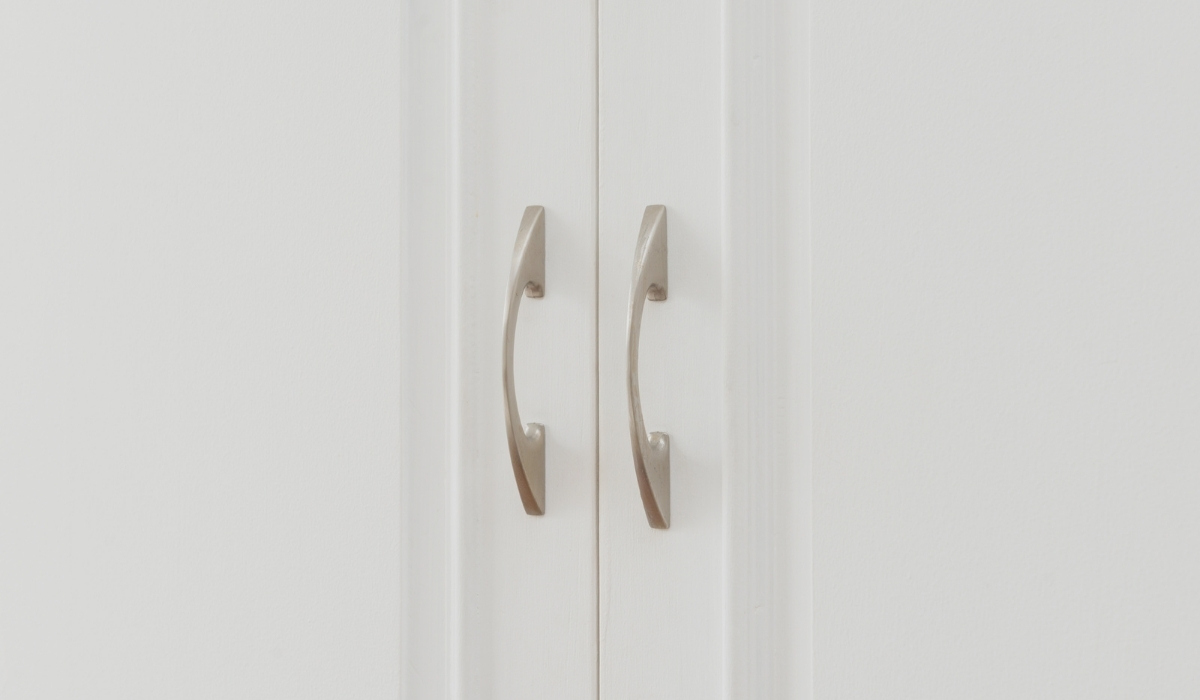 Door Pull handle on a white wooden door